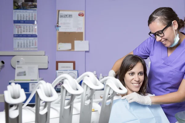 Dental assistant and female patient