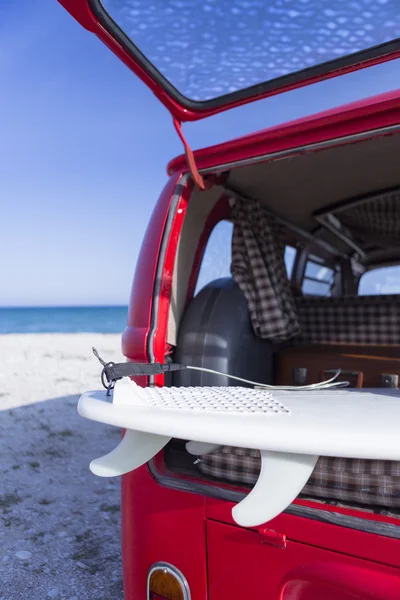 Surf board in a van