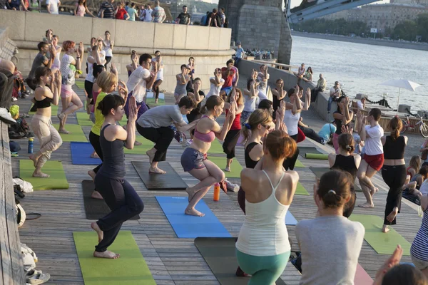 People participating in  Yoga class