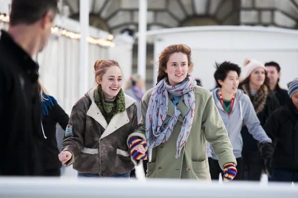 Skaters Beating the Winter Blues at the Annual Christmas Ice Rink