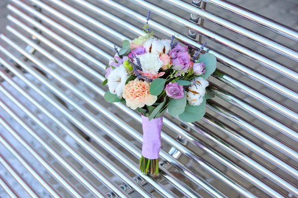 Bridal bouquet with roses and cotton