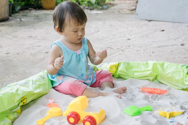 Baby playing toys in sand at home, is fantastic in aiding a toddler s development and it such fun activity to boot