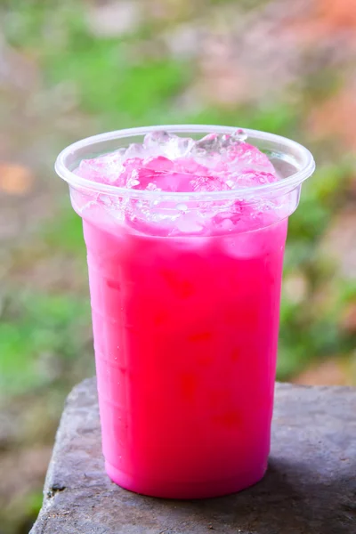 Pink milk Sweet.Cold drink relieve hot well.