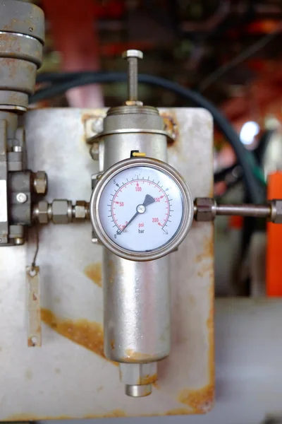 Pressure gauge in oil and gas production process.