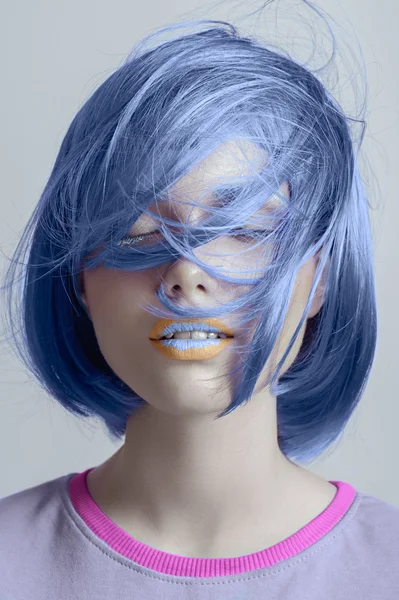 Girl with blue hair and white skin