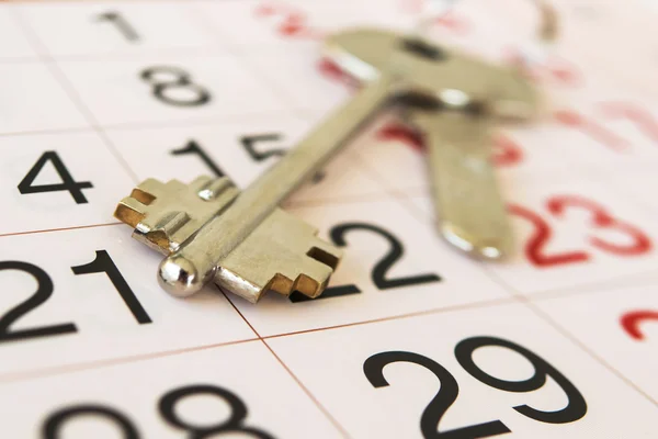 The keys to the apartment  and calendar