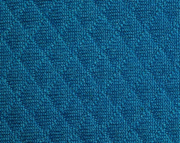 Blue fabric texture with diamond pattern. Fabric texture with rhombuses. Closeup