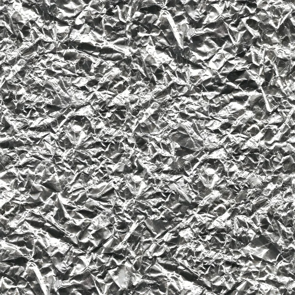 Seamless texture of silver metallic crumpled foil sheet.
