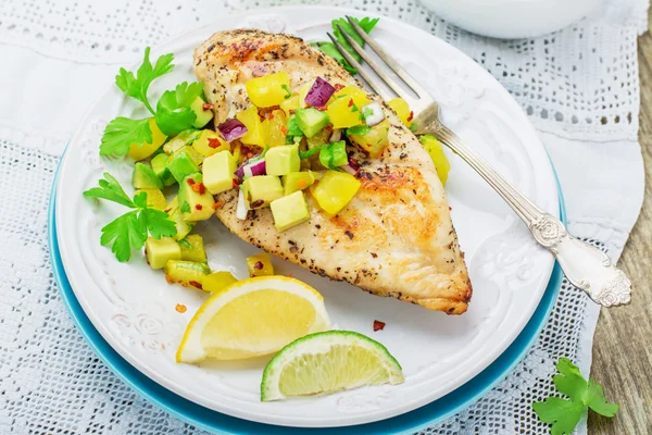 Grilled chicken breast with salsa pineapple, avocado and sweet red onion,