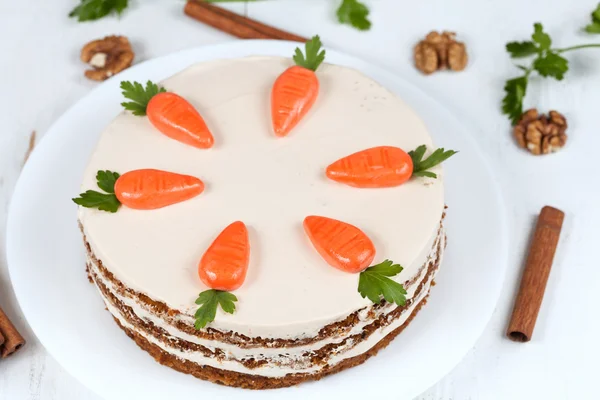 Homemade carrot cake with little carrots on top