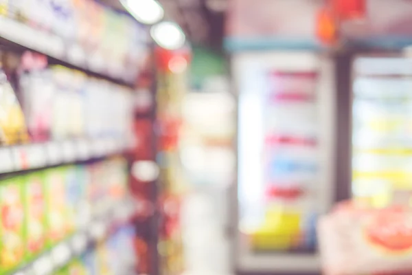 Product on shelves in supermarket with bokeh