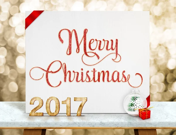 Merry Christmas red glitter text on white paper card with 2017 n