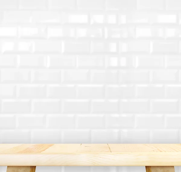 Table and white ceramic brick wall