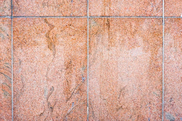 Orange stone block pavement texture background