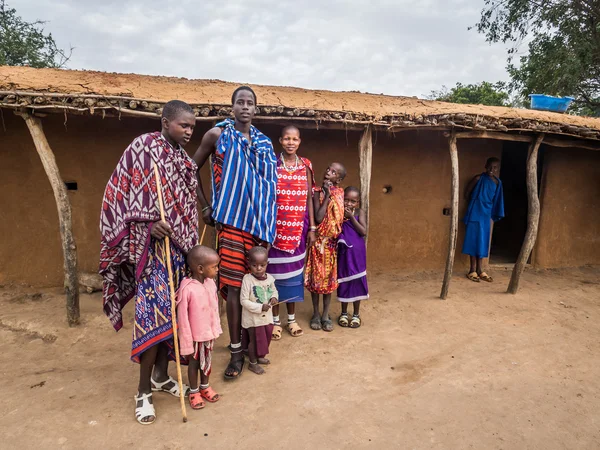 Maasai family wearing traditional  clothes