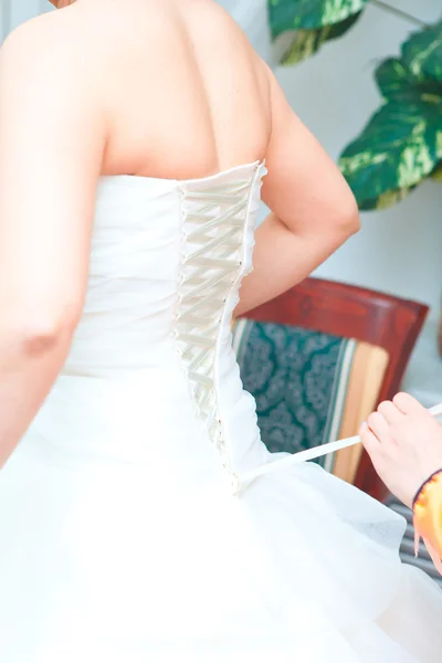 Bride dressed in wedding dress, close-up, back, wedding, bride bridesmaid dresses