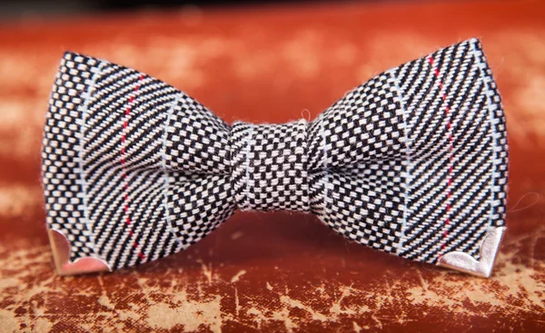 Bow tie with a black and white pattern
