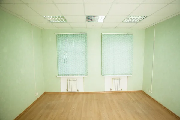 Empty office space with windows