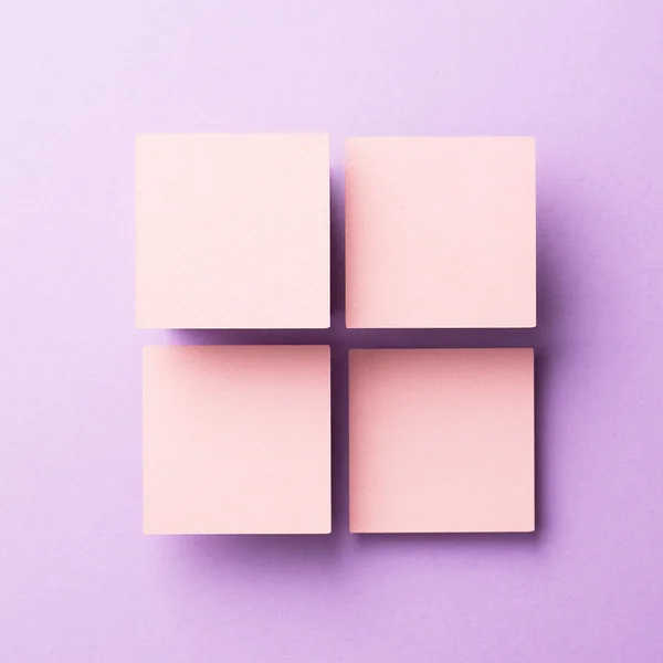 Paper squares organized over purple