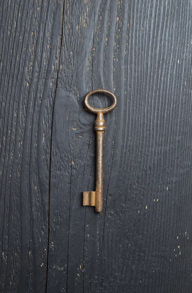 Vintage Key over wooden tabl