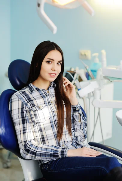 Beautiful young girl in the dentist\'s chair