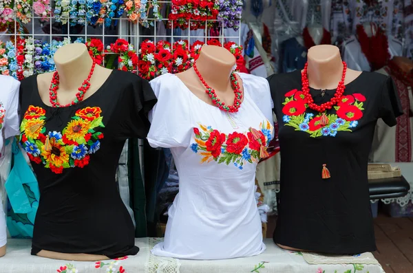 Street trade on Slavonic Bazaar Festival. Clothing with embroidery