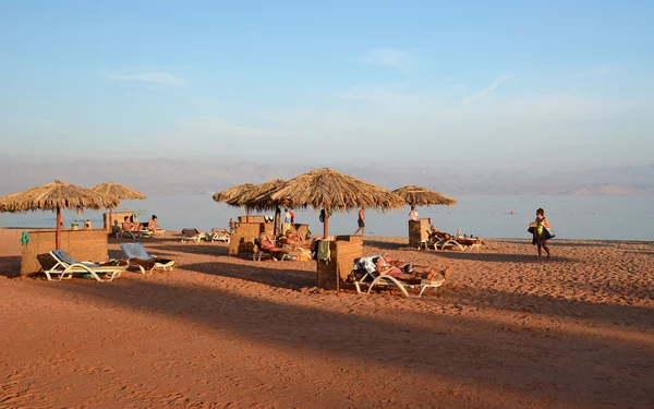People are resting on the beach in Egypt