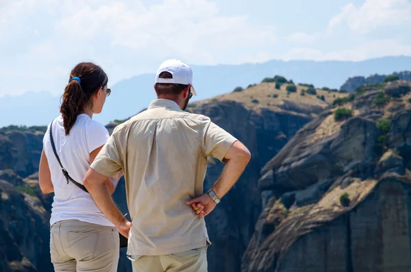 Tourists on a viewing platform in Meteors (Greece) admire the view