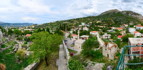 Panoramic view from fortress wall of city Bar in foothills, Montenegro