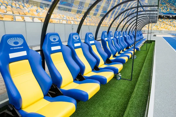 KIEV (KYIV), UKRAINE - October 04, 2012: Empty coaching chairs before a football match.