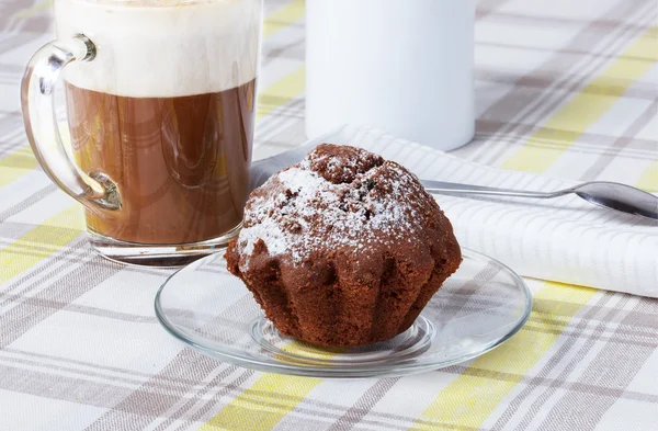 Cappuccino with cupcakes, tablecloth, cup