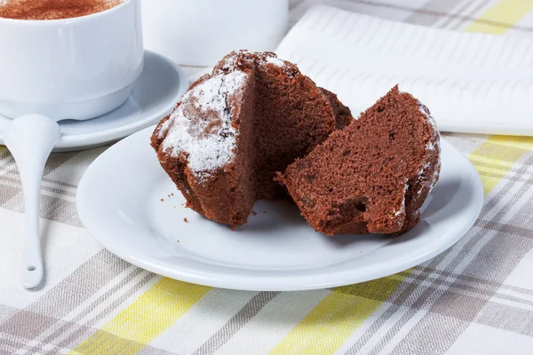 Cappuccino with cupcakes, tablecloth, cup