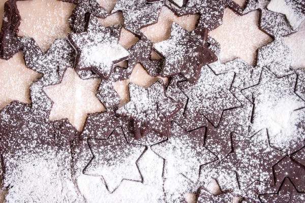 Cutting gingerbread cookies. Process of baking cookies at hom