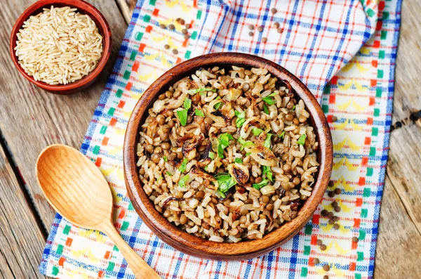 Lentils and rice with Crispy Onions and Parsley. Mujadara