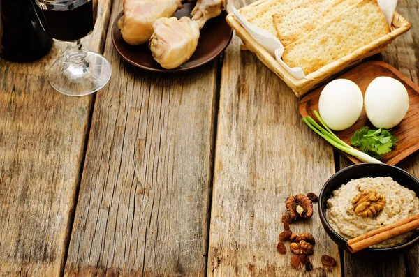 Matzah, wine, eggs, chicken, greens and haroset
