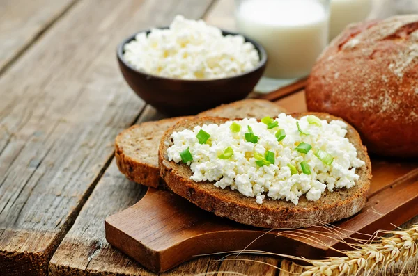 Healthy Breakfast with whole grain rye bread, cottage cheese and