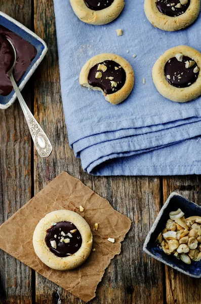 Cashews butter cookies with cashews and chocolate frosting
