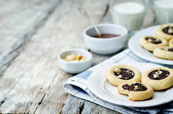 Cashews butter cookies with cashews and chocolate frosting