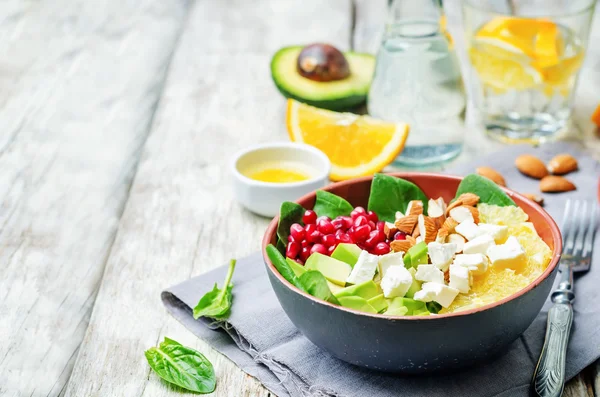 Spinach feta avocado pomegranate orange almond salad with orange