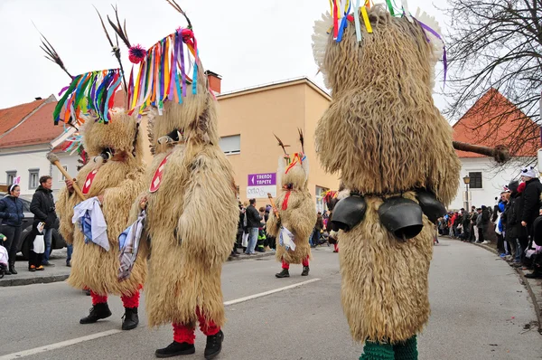 Traditional carnival with traditional figures, known as kurent,
