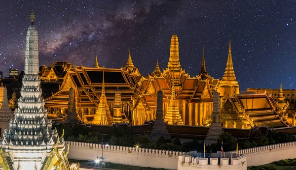 The beauty of the Emerald Buddha Temple at Milky way galaxy