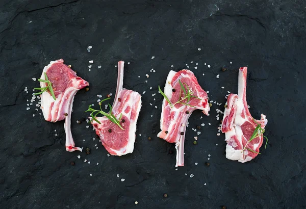 Raw lamb chops.