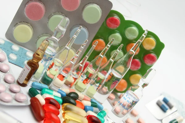 Colorful tablets and pills background