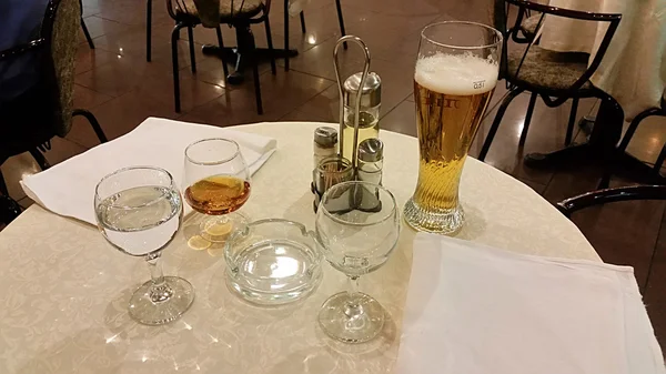 Glasses with drinks on the table