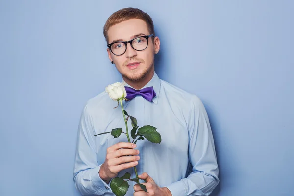 Cute young men with flower. Date, birthday, Valentine