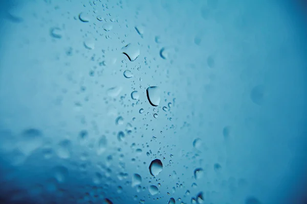 Drops of rain on a window glass