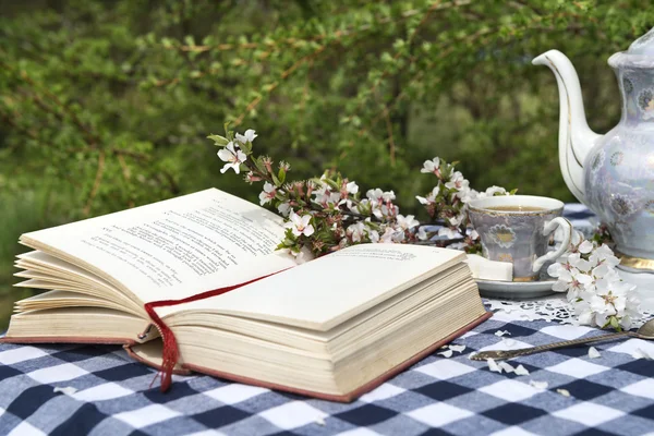 Still life with book and cup of tea