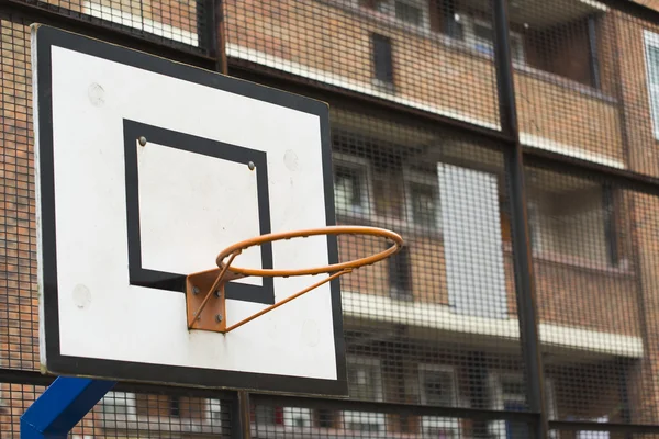 Basketball hopo and backboard in a housing estate