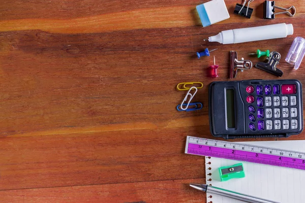 School or Office Supplies on Top of Wooden Table. Captured at Right Border Frame with Copy Space on the Left Side.