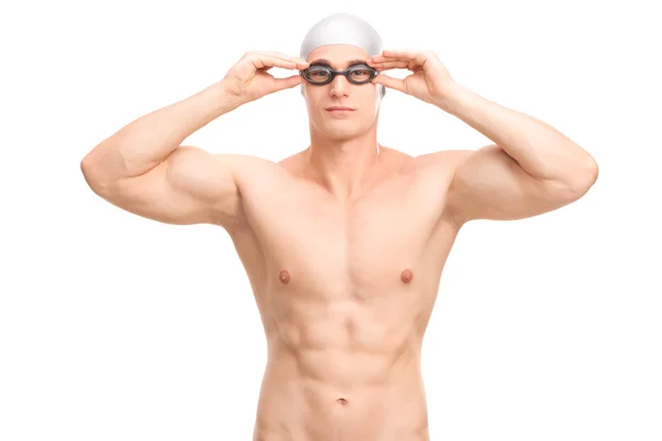 Swimmer with a swim cap and goggles